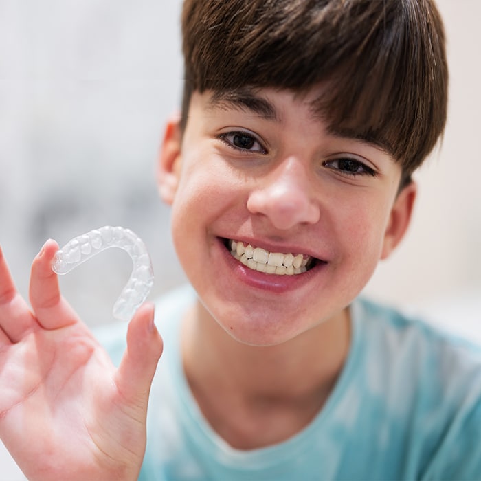 Boy with Clear Aligner