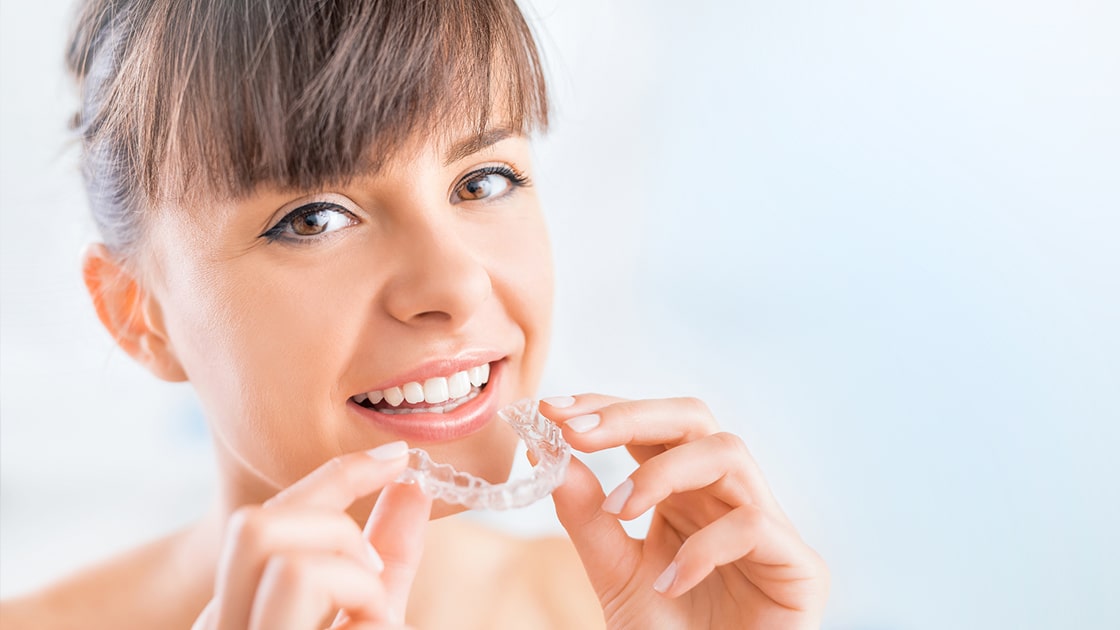 Woman with Aligners